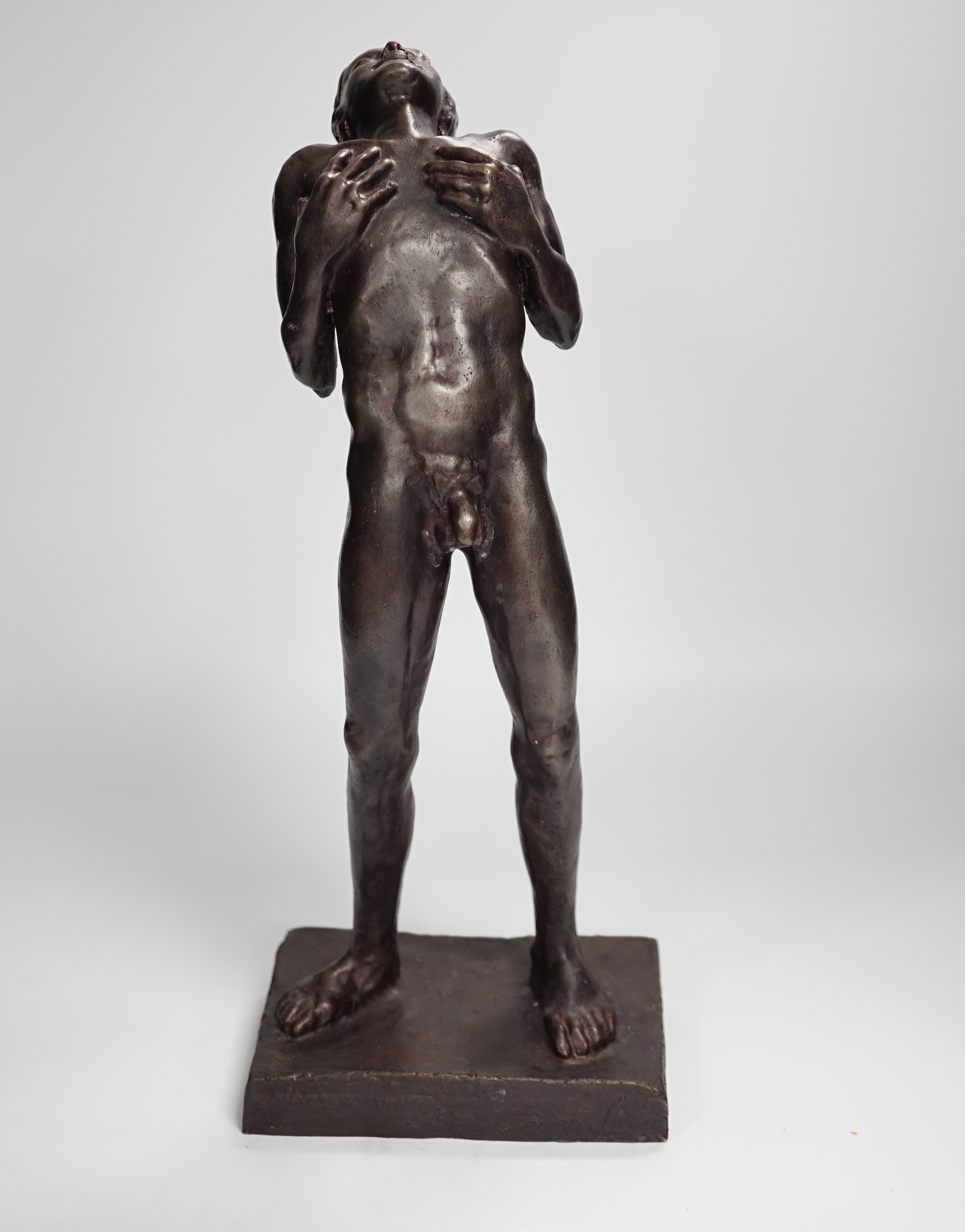 A bronze of a standing male nude, 36cm high